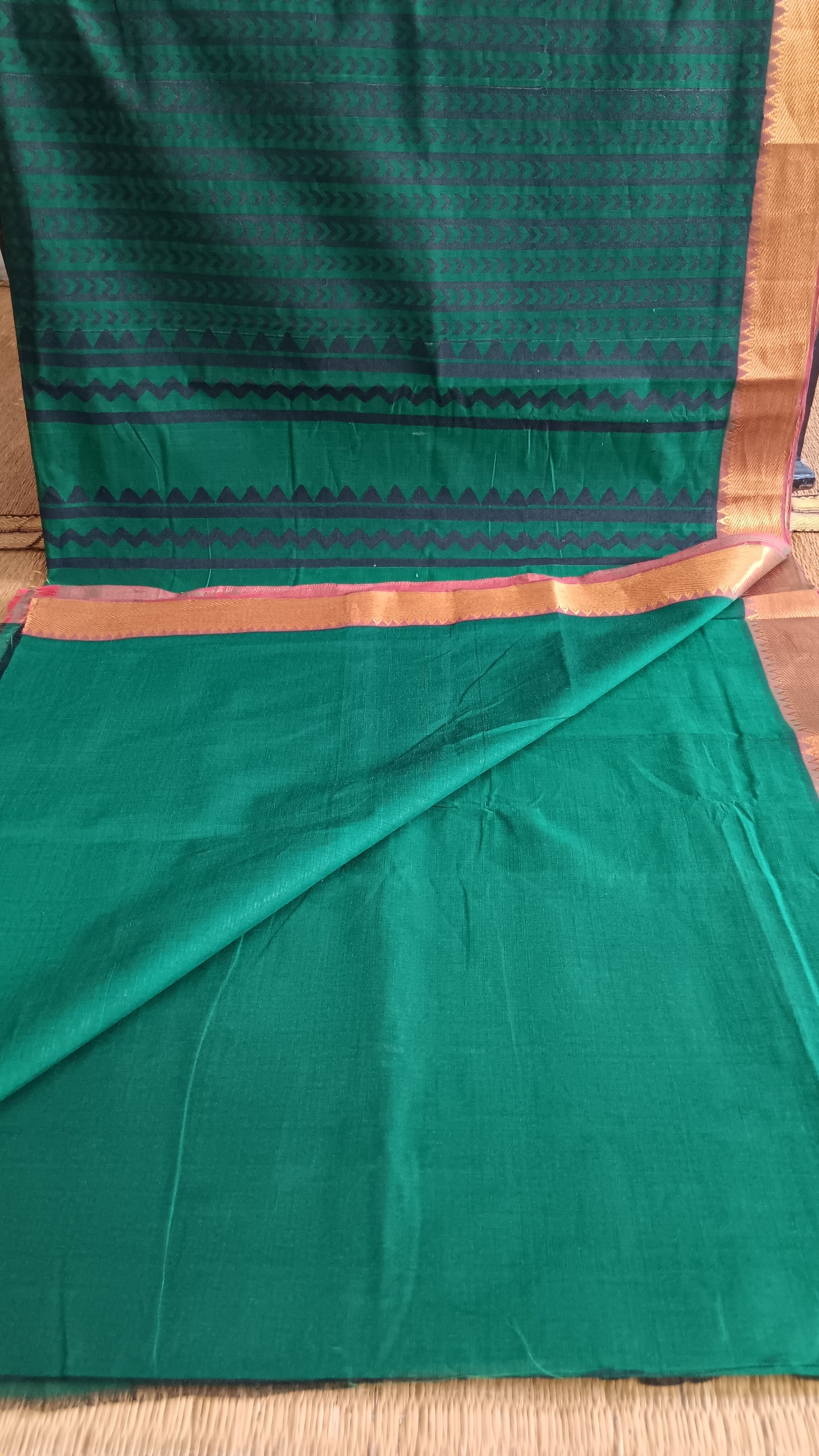 View from the top of the plain blouse of a bottle green, function wear, hand woven Mangalgiri cotton saree