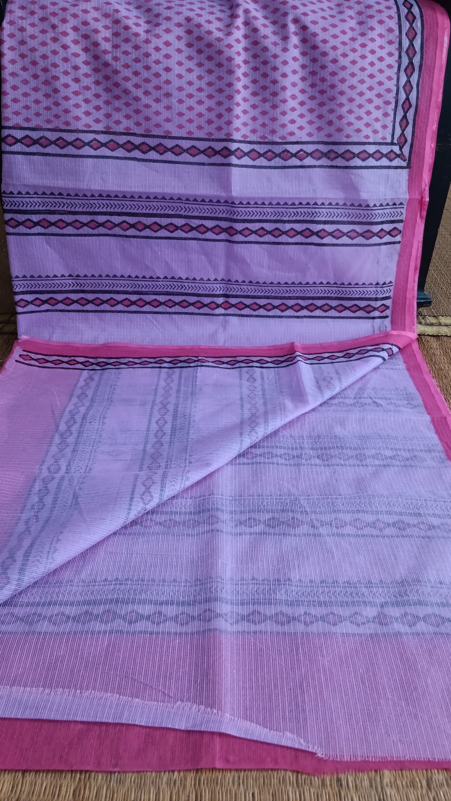 View from the top of the plain blouse of a light weight daily wear kota cotton saree