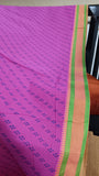 Sunny yellow thread border adds a pop of color to the elegant pink cotton saree.