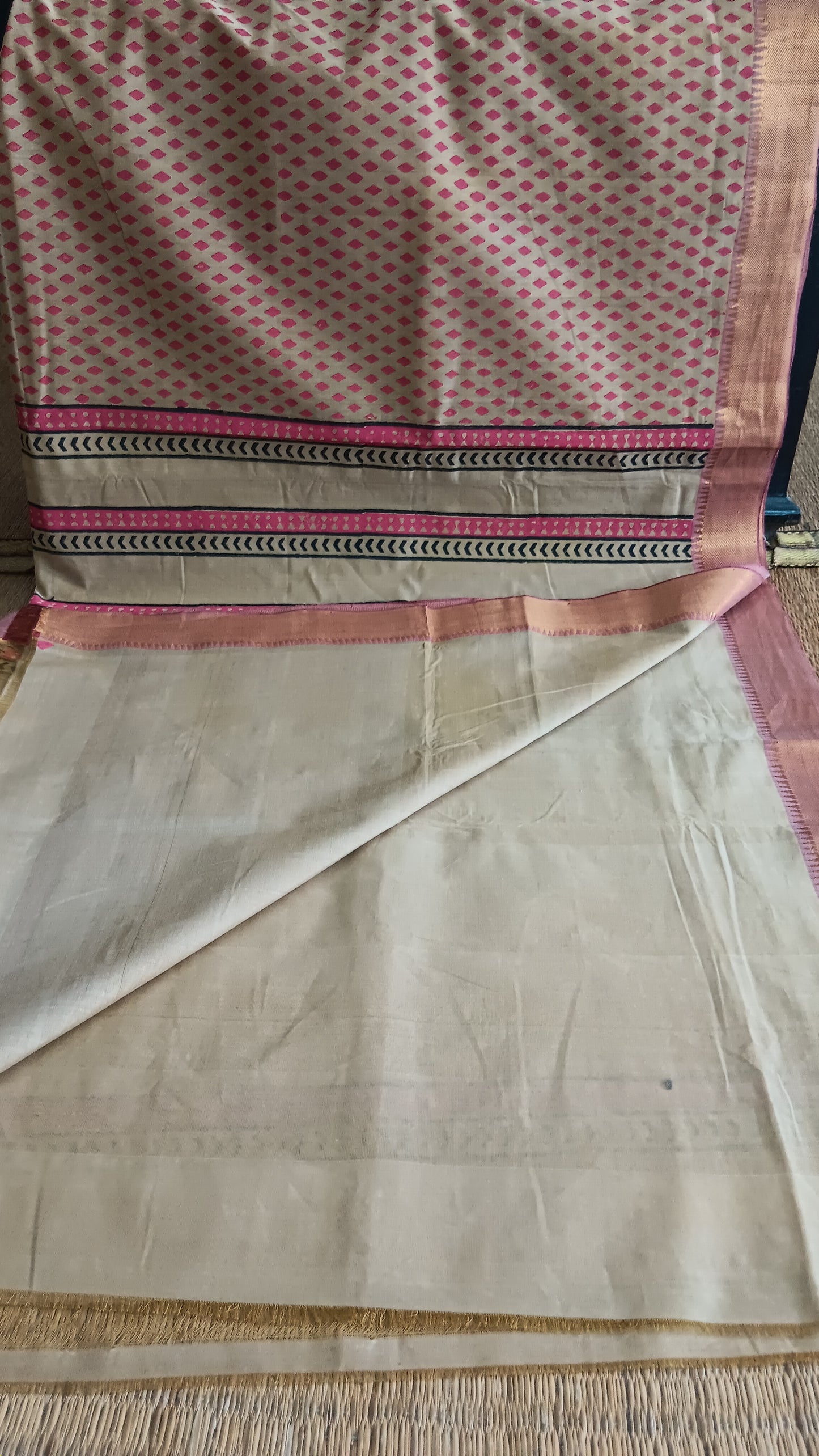 View from the top of the plain blouse of a beige daily wear hand woven Mangalgiri cotton saree