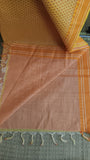Plain yellow blouse included to complete your look in this uplifting daily wear saree