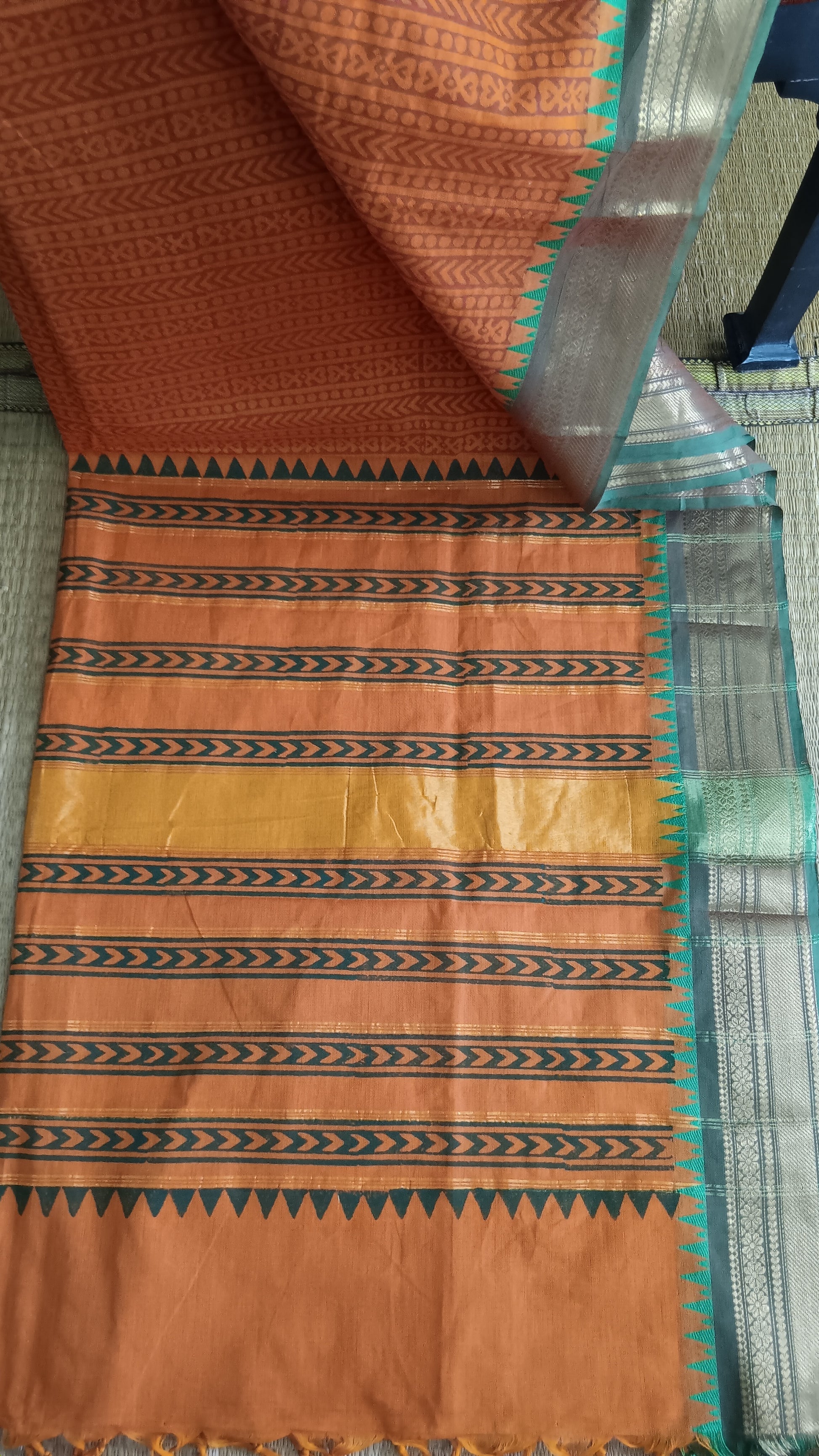 View from the top of the block printed pallu of a south cotton function wear cotton saree