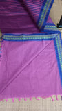 Plain pink cotton blouse included with the saree.