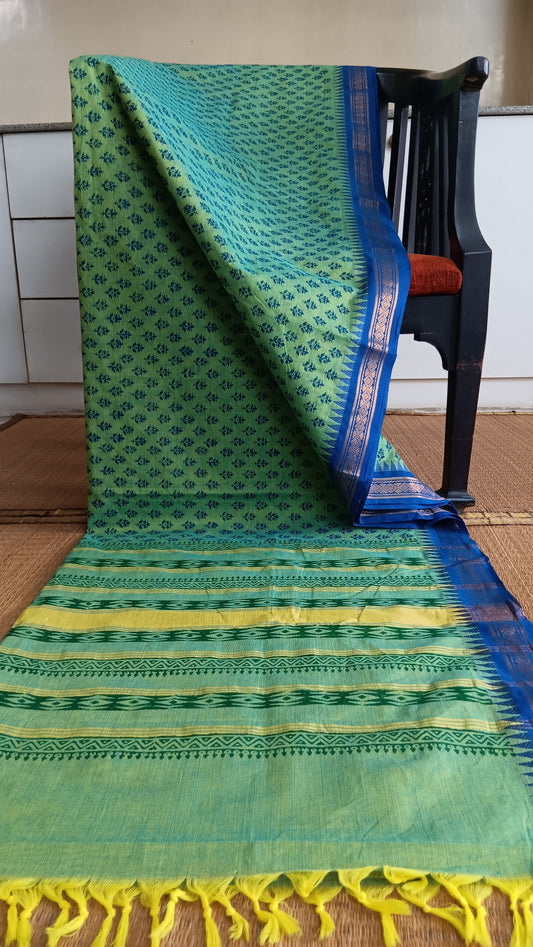 block printed green south cotton saree with blue zari border