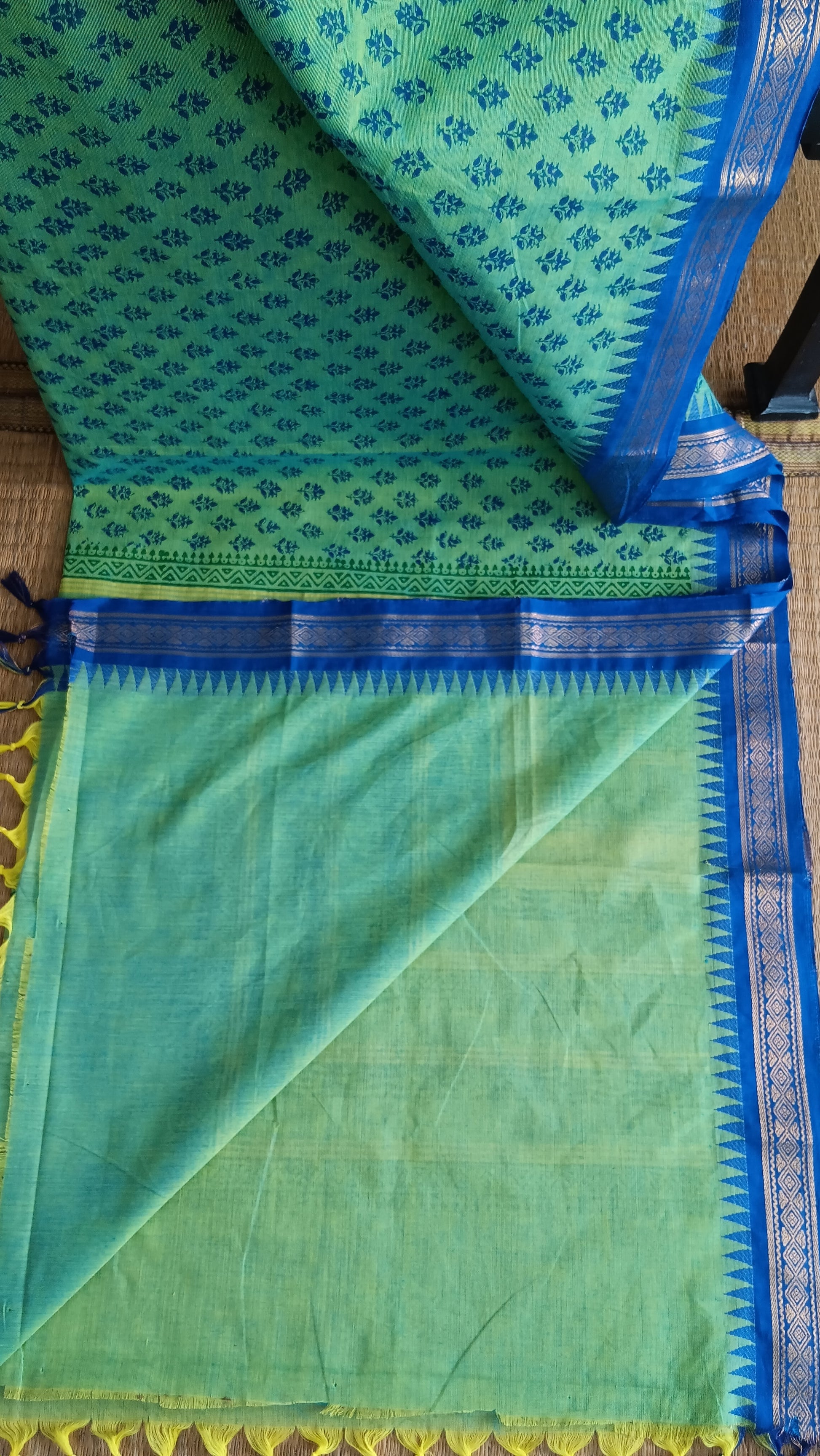 View from the top of the plain blouse of a function wear cotton saree from south india