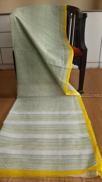 full view of a green and yellow block printed kota cotton saree
