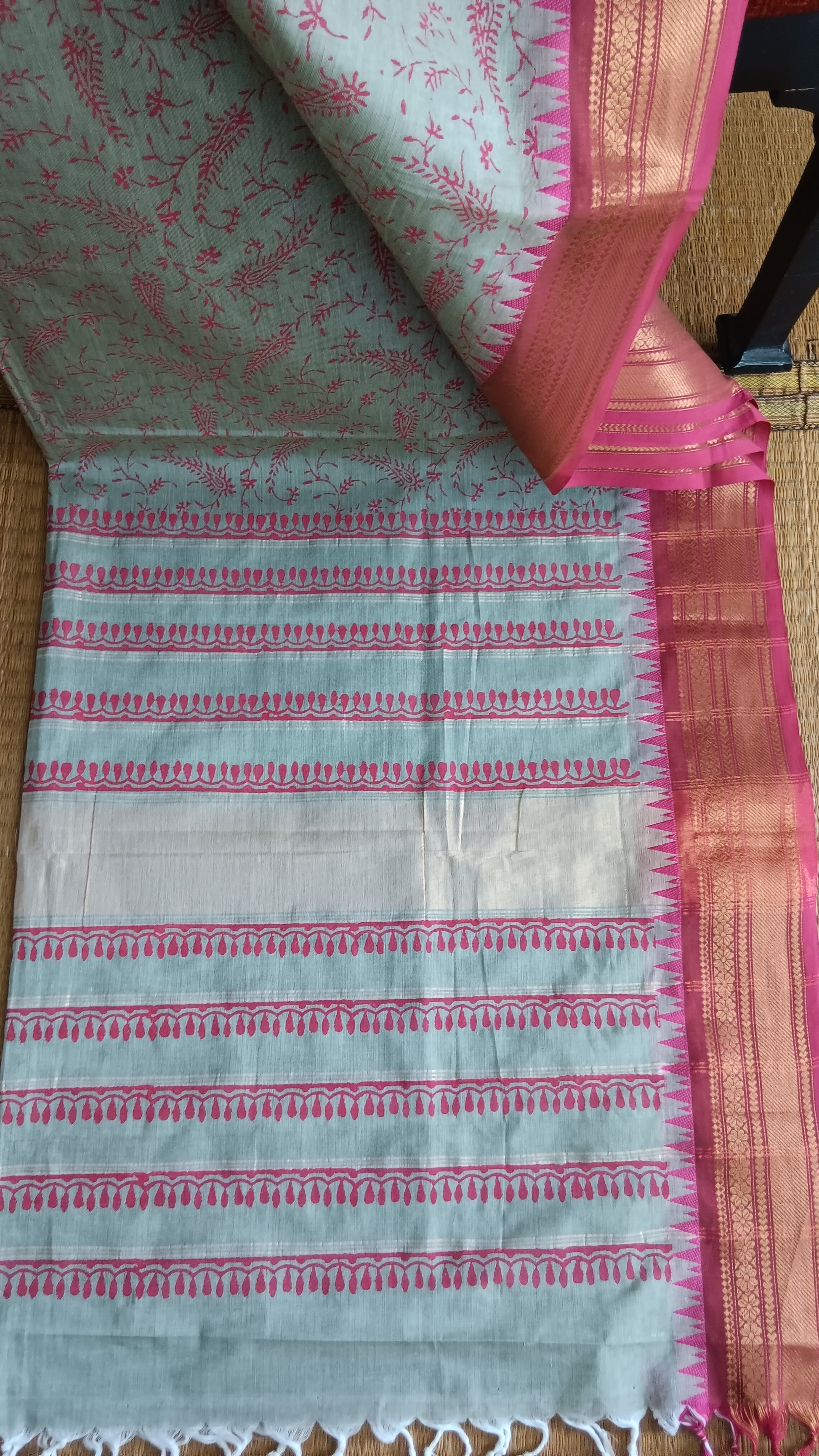 View from the top of the block printed pallu of a function wear cotton saree