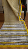 Block printed pallu of a daily wear kota cotton saree in black and yellow
