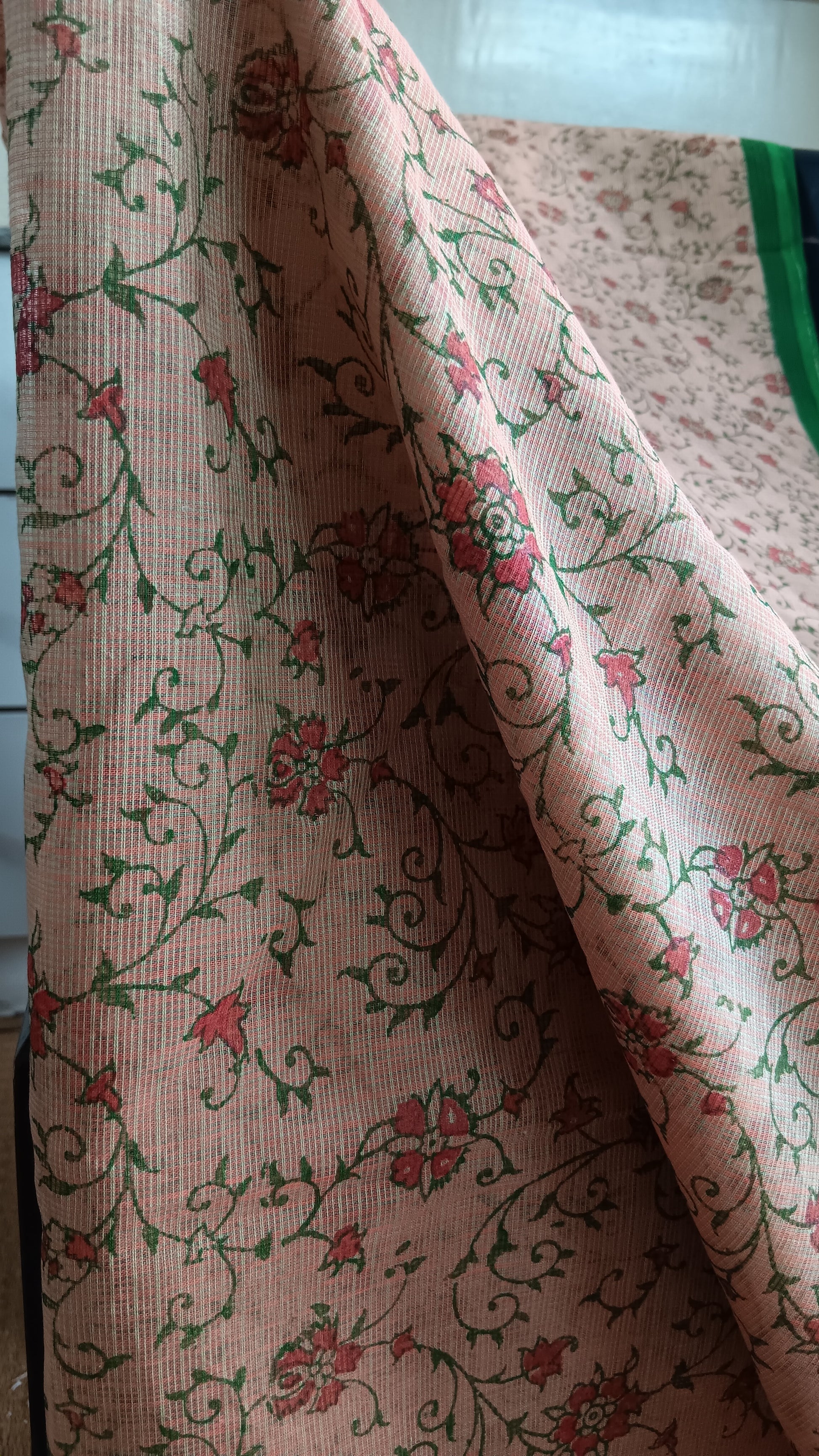 close up view of the floral patterns block printed on the body of a daily wear kota cotton saree