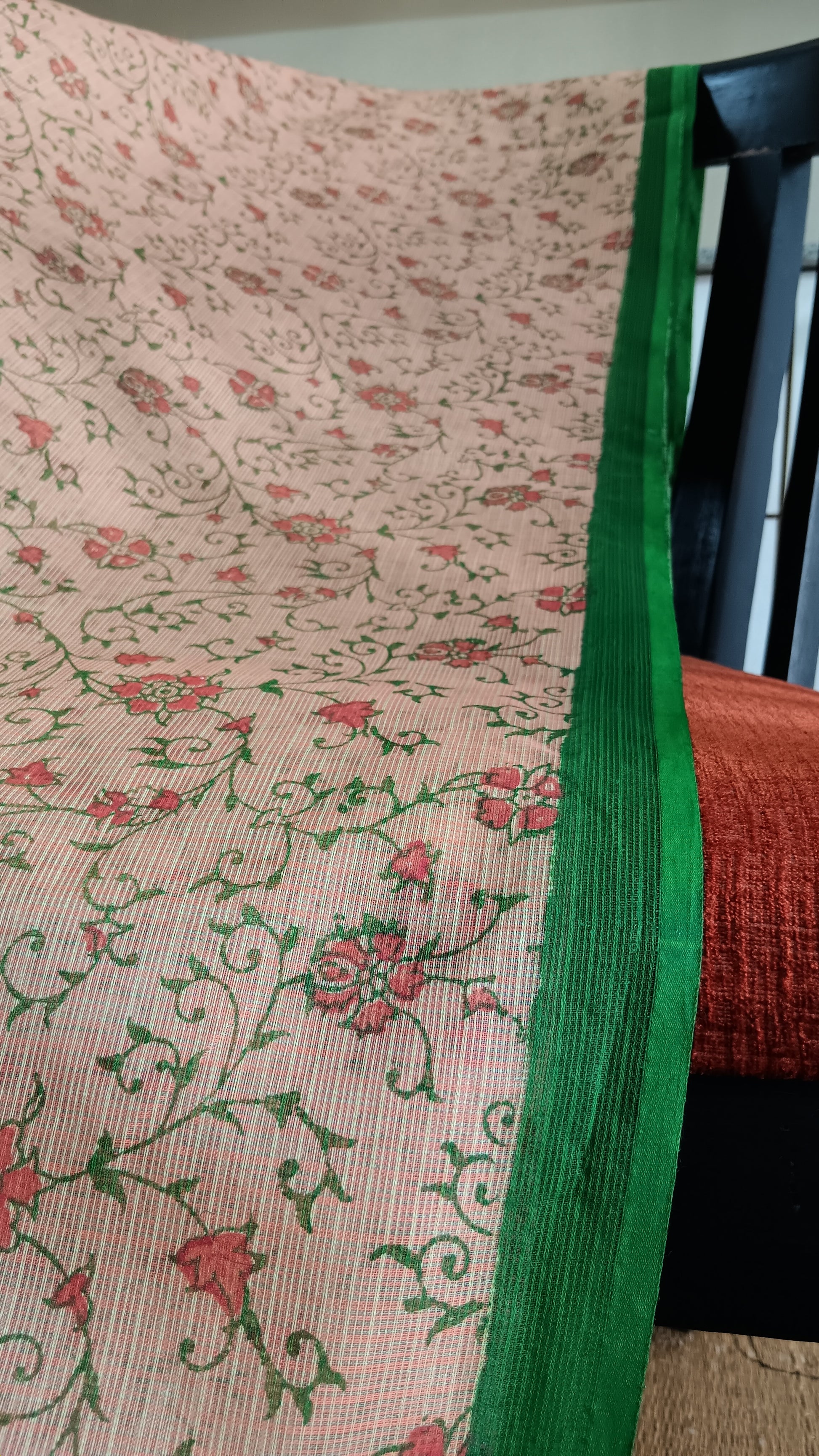 Close up view of the green border of a daily use kota cotton saree