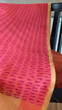  Close-up of block printed border on handwoven pink silk cotton saree