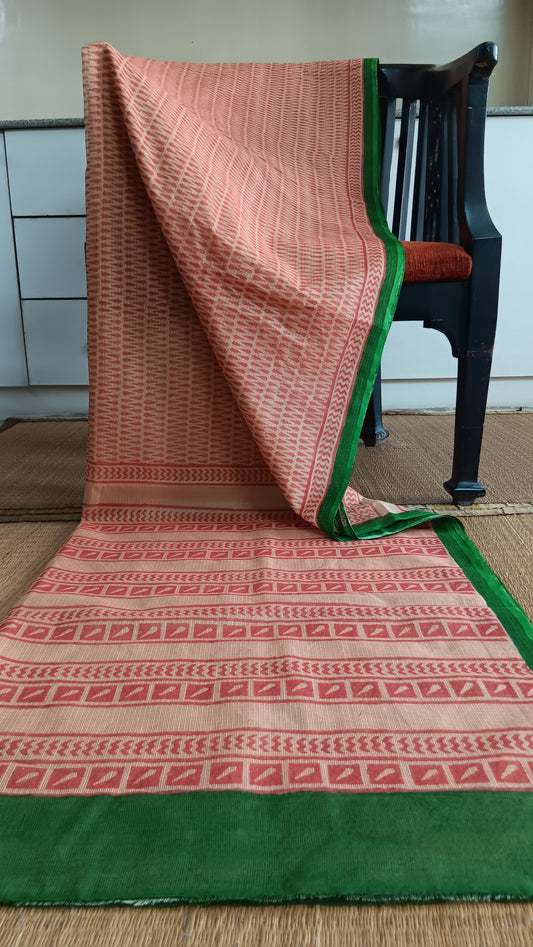 hand block printed daily wer kota cotton saree with geometric patterns printed on the body and pallu