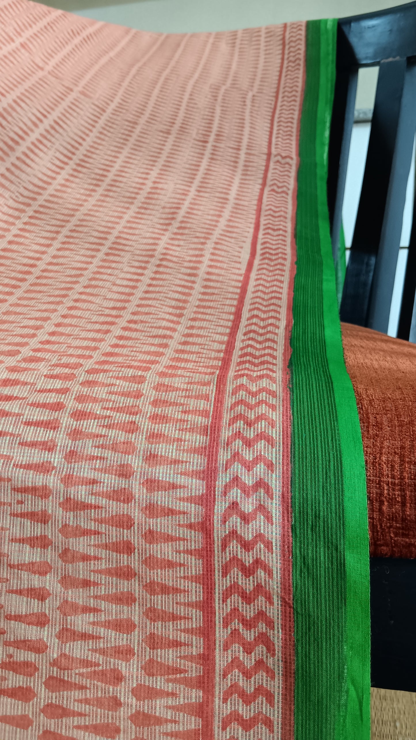 Close up view of the green border of a daily wear kota cotton saree
