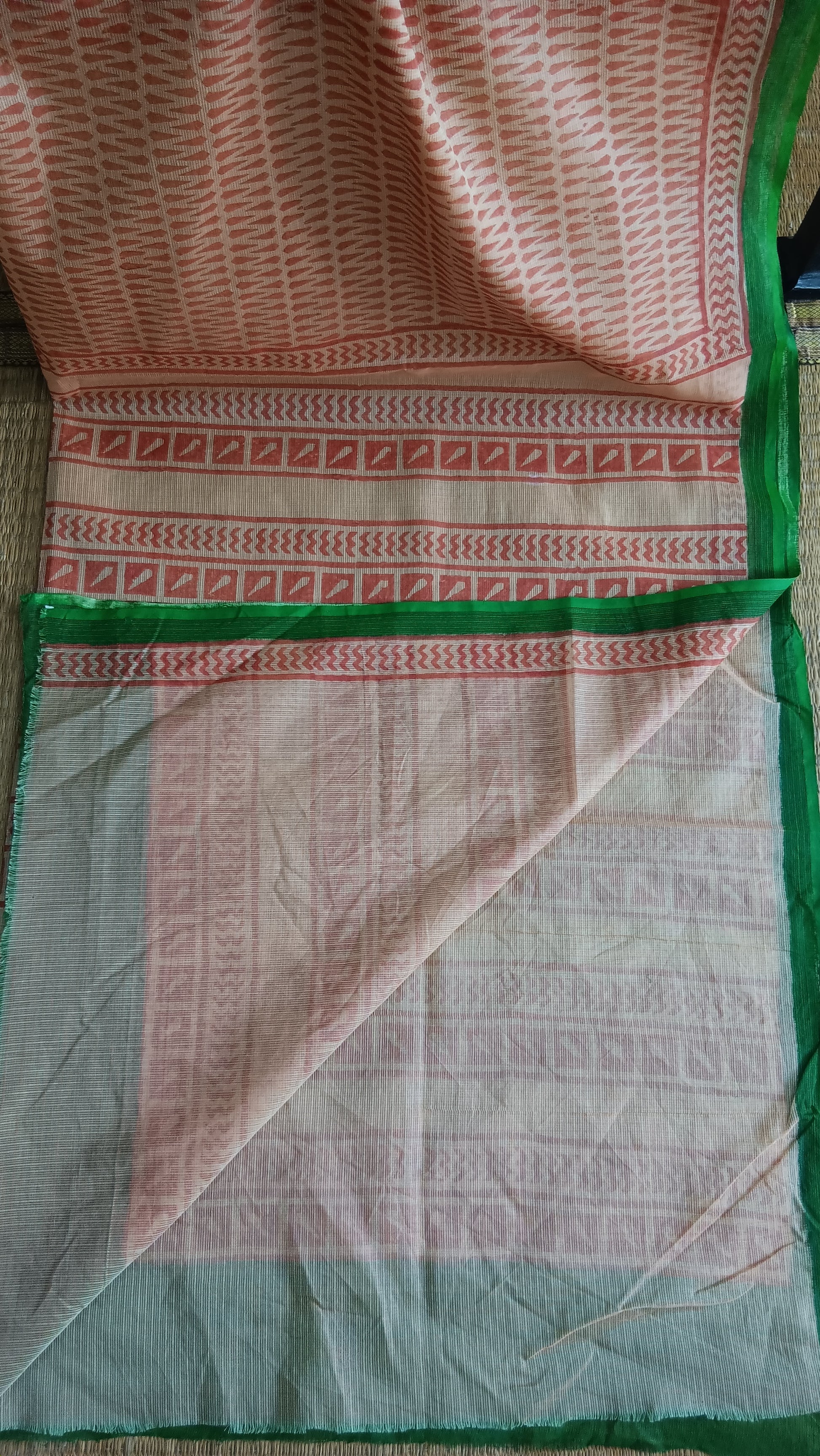 View from the top of the plain blouse of a hand block printed daily use kota cotton saree