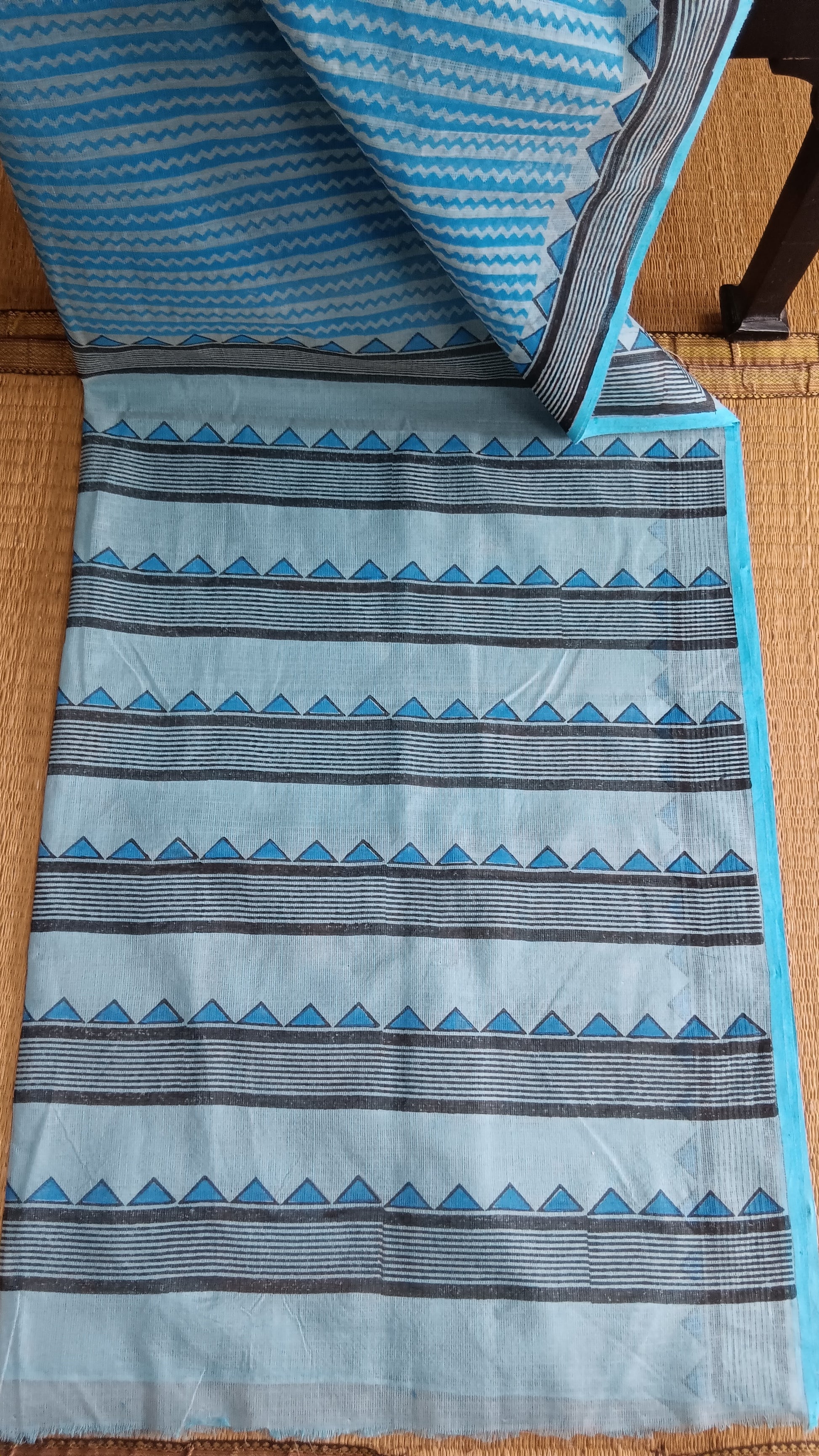 View from the top of the block printed pallu of a blue daily wear kota cotton saree