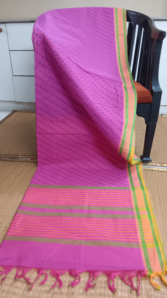 Effortless Elegance: Pink Cotton Saree with Blue Prints (Daily Wear). Simple blue geometric prints and a contrasting yellow border adorn this soft pink cotton saree, perfect for adding a touch of everyday sophistication.
