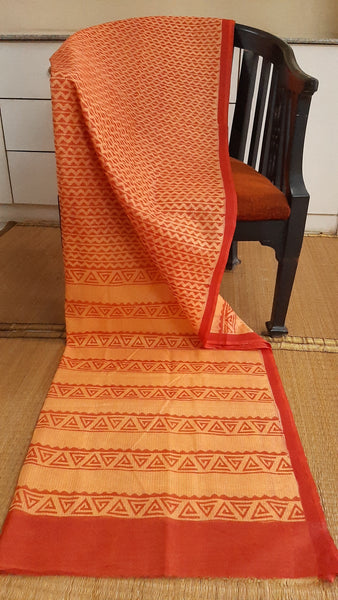 bold geometric prints hand block printed on the body of a rust light weight daily wear kota cotton saree