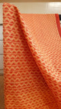 close up view of the bold geometric pattern block printed on the body of a daily wear light weight kota cotton saree