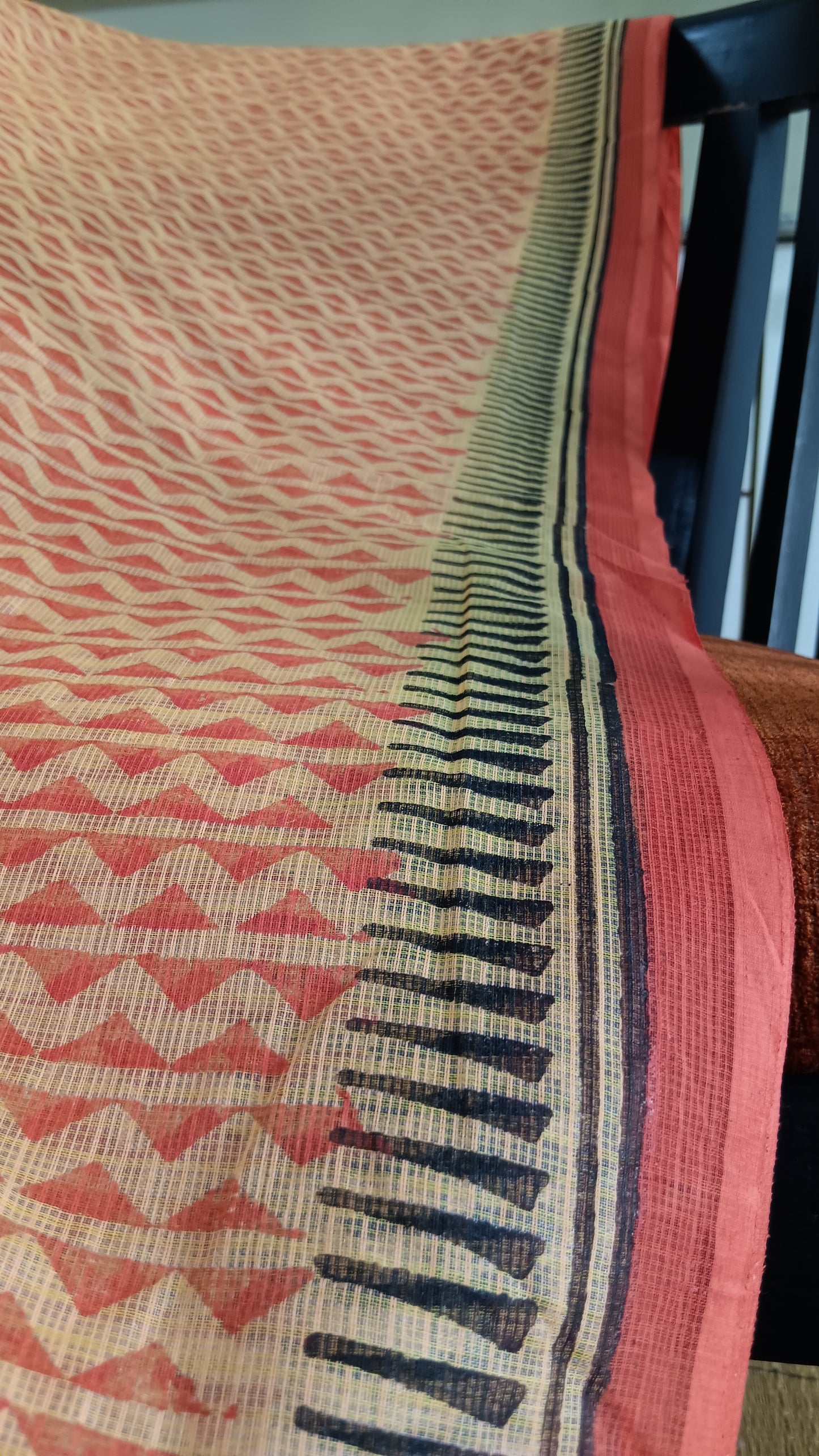 Close up view of the block printed border of a light weight kota cotton saree