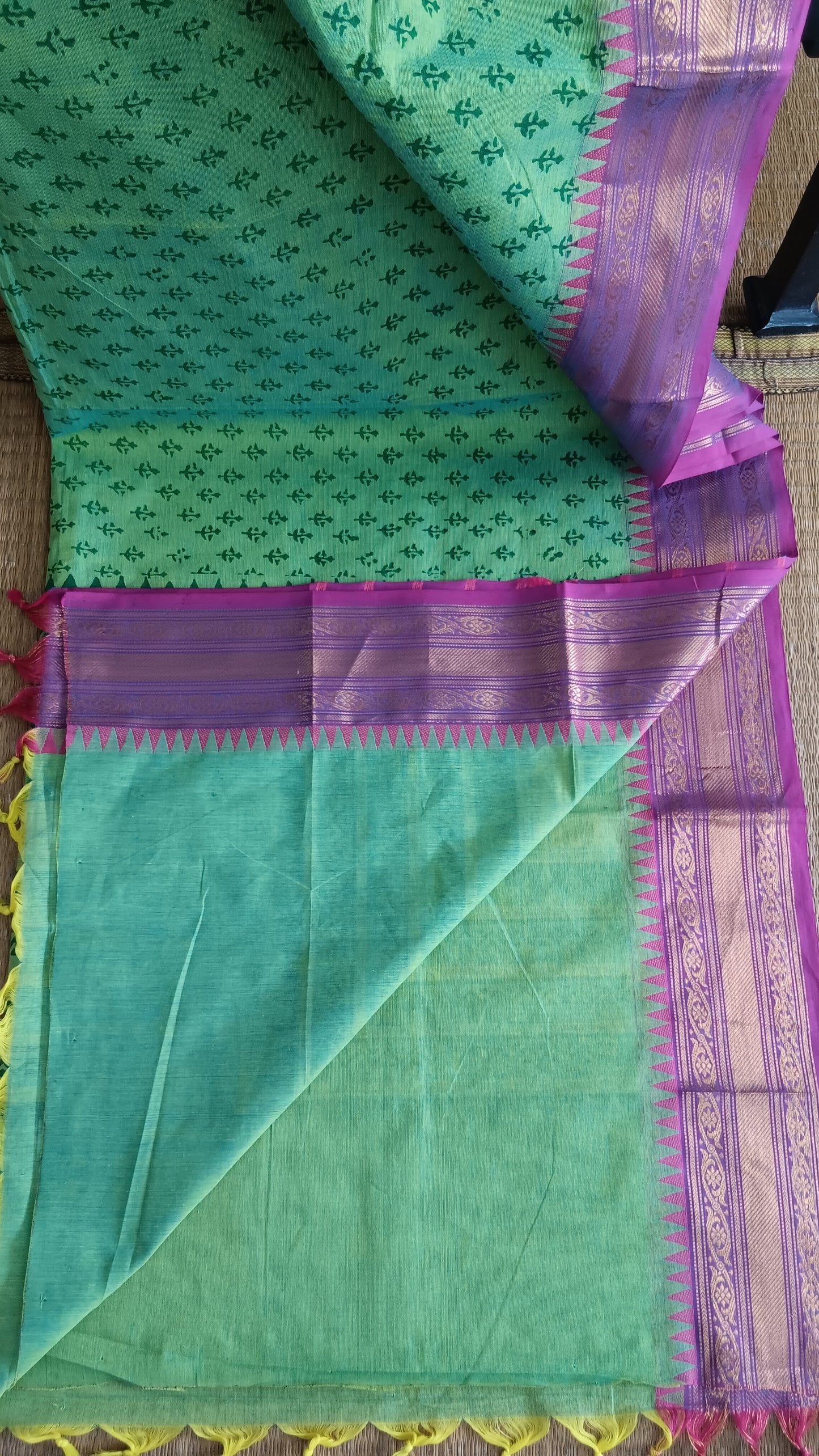 View from the top of the plain blouse of a block printed south cotton function wear saree