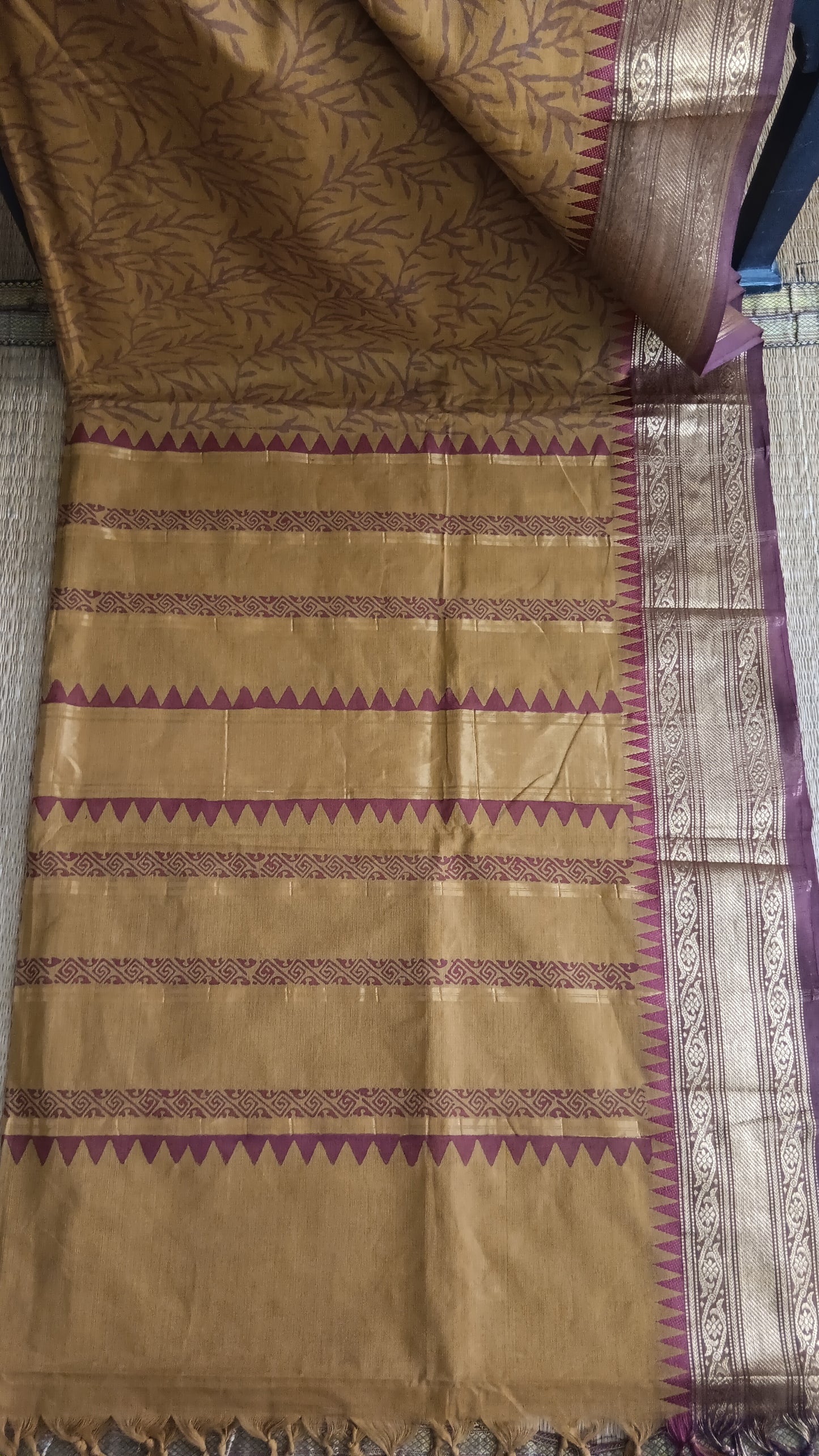 View from the top of the block printed pallu of a south cotton function wear saree