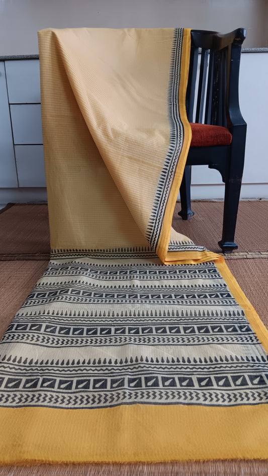 Light weight daily wear kota cotton saree with yellow stripes block printed on the body