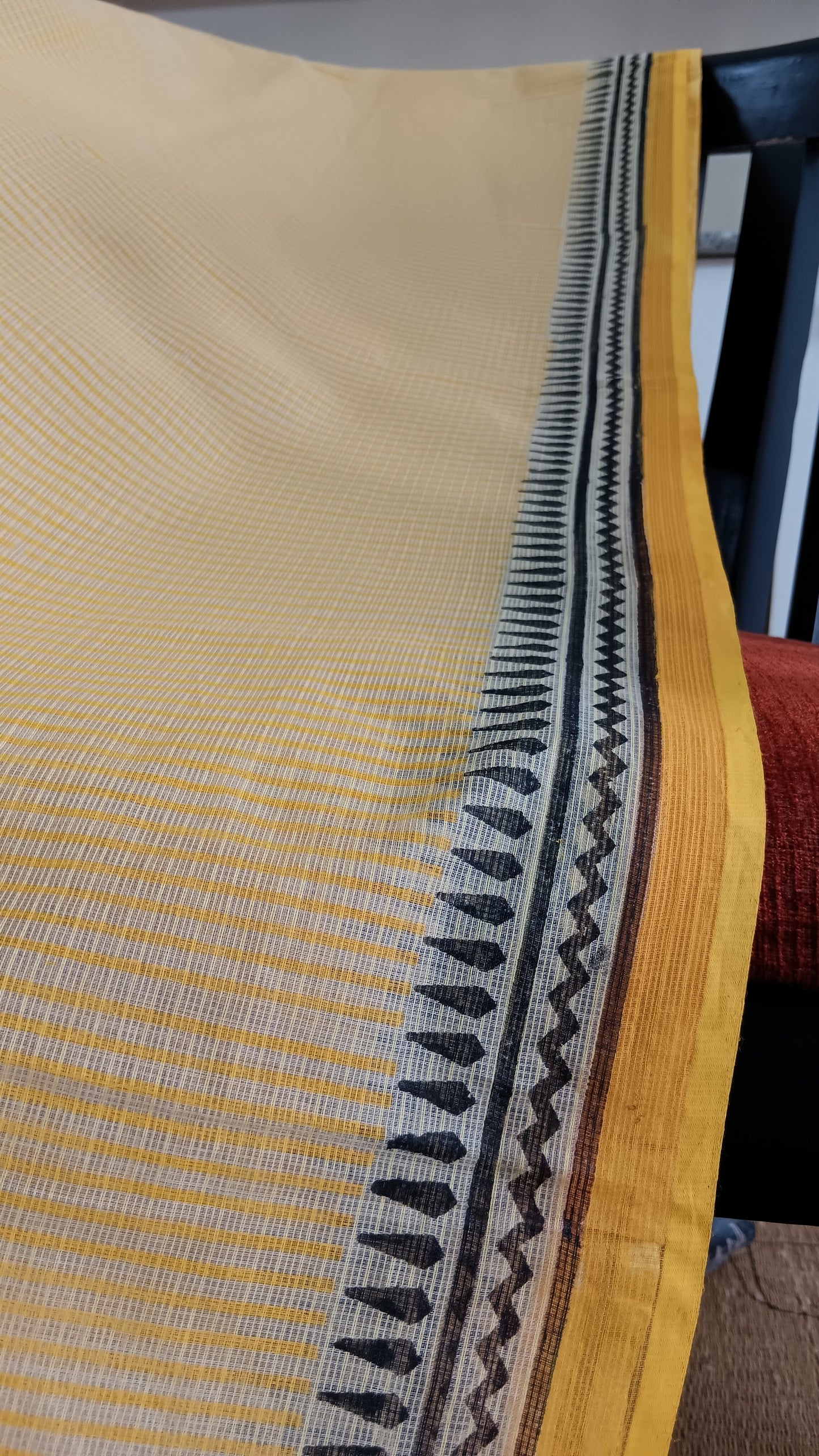 Close up view of the border of a daily wear printed kota cotton saree