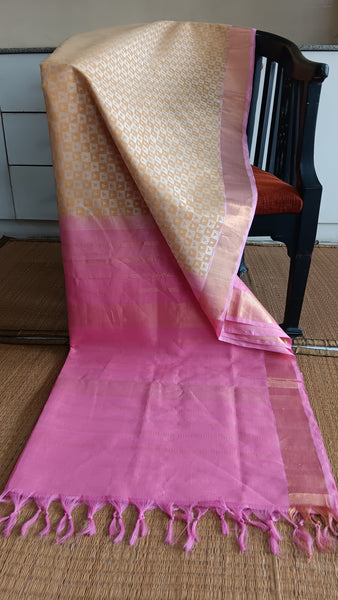Handwoven silk cotton saree in cream with beige geometric block print and baby pink pallu.